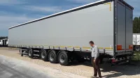 Четырехосный шторно-бортовой полуприцеп Тонар